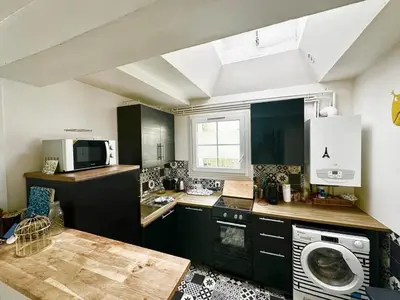 Cuisine ou kitchenette dans l'établissement Le Falguière - 2ch