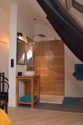 Un ou plusieurs lits dans un hébergement de l'établissement La Luxure- Loveroom