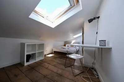 Télévision ou salle de divertissement dans l'établissement Duplex atypique et cosy au cœur de Rouen