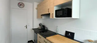 Cuisine ou kitchenette dans l'établissement L'Eure Au Soleil, avec balcon et Wifi