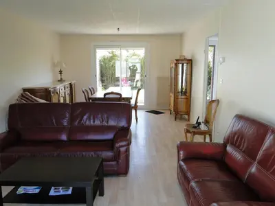 Coin salon dans l'établissement Villa Les Pélicans