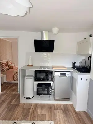 Cuisine ou kitchenette dans l'établissement Literie d'exception, luxe calme et confort