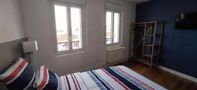 Un ou plusieurs lits dans un hébergement de l'établissement Villa Quai 22 Vue Port !
