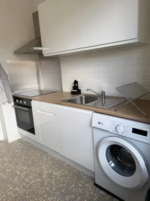 Cuisine ou kitchenette dans l'établissement Appartement neuf, moderne et lumineux à Vernon