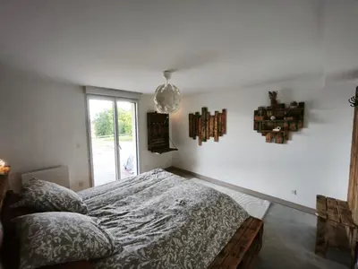 Un ou plusieurs lits dans un hébergement de l'établissement B&B Spa 60