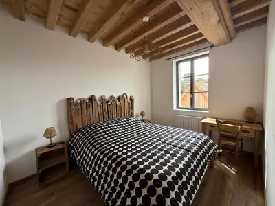 Un ou plusieurs lits dans un hébergement de l'établissement Le Gîte du Bonheur - Maison normande familiale