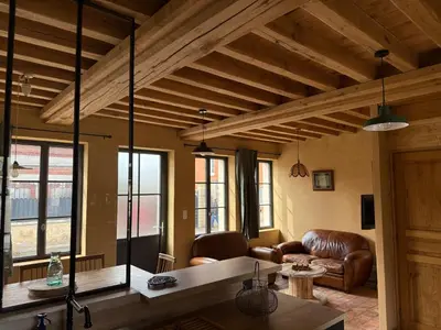 Coin salon dans l'établissement Le Gîte du Bonheur - Maison normande familiale