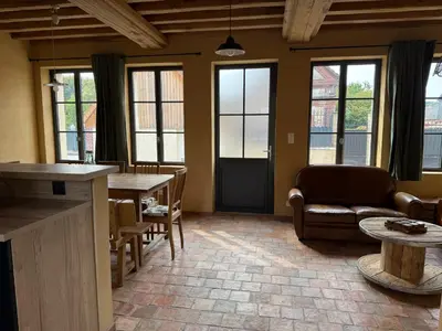 Coin salon dans l'établissement Le Gîte du Bonheur - Maison normande familiale