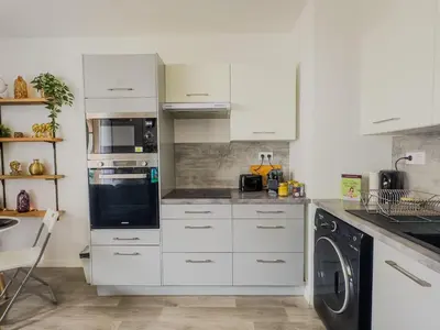 Cuisine ou kitchenette dans l'établissement Le Cosy Chic - F2