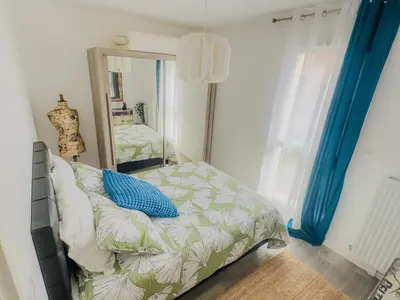 Un ou plusieurs lits dans un hébergement de l'établissement Le Cosy Chic - F2