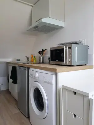 Cuisine ou kitchenette dans l'établissement Le Fleury Studio Calme Proche de Rouen