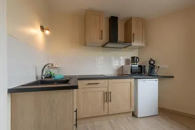 Cuisine ou kitchenette dans l'établissement Le Reflet de la Motte - Avec terrasse
