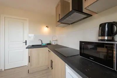 Cuisine ou kitchenette dans l'établissement Le Reflet de la Motte - Avec terrasse