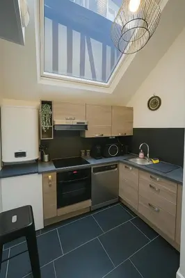 Cuisine ou kitchenette dans l'établissement charmant appartement 4 pers hyper centre, au calme