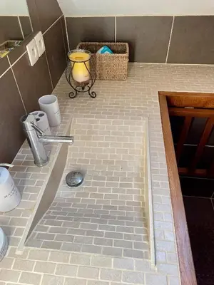 Salle de bains dans l'établissement L'Ormelet