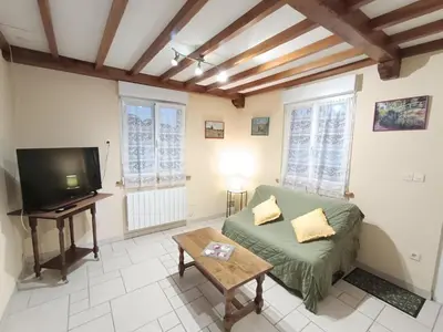 Télévision ou salle de divertissement dans l'établissement Gite La Dem'Eure à Soy