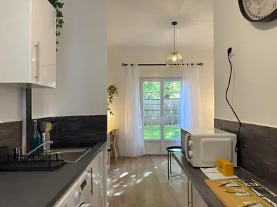 Cuisine ou kitchenette dans l'établissement Appartement tout confort d Elbeuf -proche gare