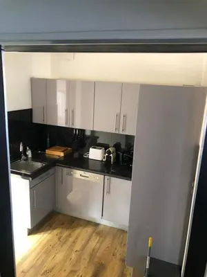 Cuisine ou kitchenette dans l'établissement Maison individuelle avec Jardinet