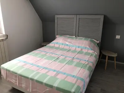 Un ou plusieurs lits dans un hébergement de l'établissement Maison individuelle avec Jardinet