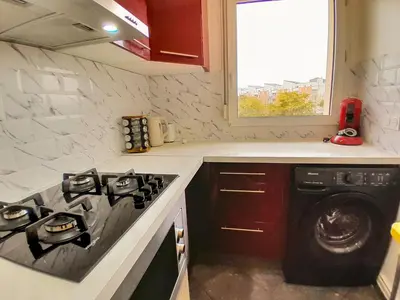 Cuisine ou kitchenette dans l'établissement Calme & spacieux, RER A 3 min, Parking, 2 salles d'eau