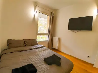 Un ou plusieurs lits dans un hébergement de l'établissement Calme & spacieux, RER A 3 min, Parking, 2 salles d'eau