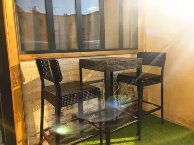 Coin salon dans l'établissement MSK Cosy Beau Studio Persan Chambly Roissy CDG