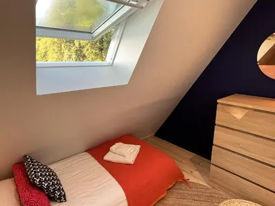 Un ou plusieurs lits dans un hébergement de l'établissement La Petite Ferme d Hyberville