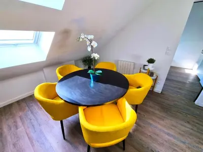 Coin salon dans l'établissement L'appartement tranquillité