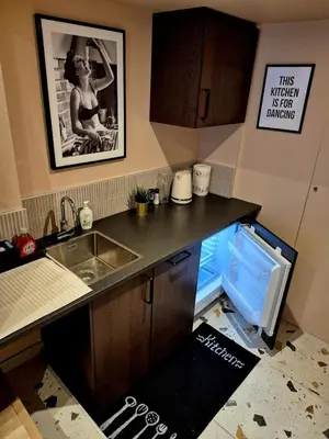 Cuisine ou kitchenette dans l'établissement Appartement jacuzzi et terrasse