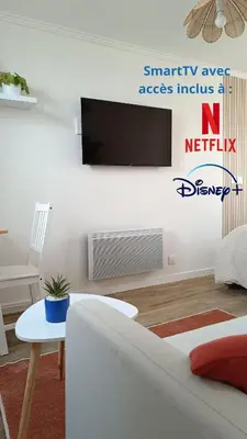 Télévision ou salle de divertissement dans l'établissement L'Escale Songeonnaise 25min Aéroport Beauvais-Tillé