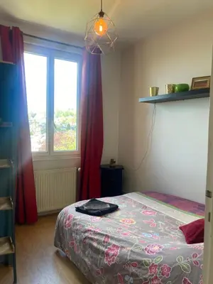 Un ou plusieurs lits dans un hébergement de l'établissement Sky Room
