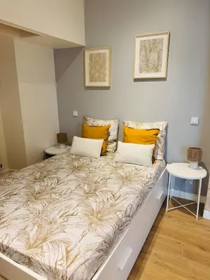 Un ou plusieurs lits dans un hébergement de l'établissement Chantilly Spa Lodge near Parc Asterix