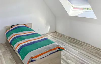 Un ou plusieurs lits dans un hébergement de l'établissement Maison Campagne Normandie