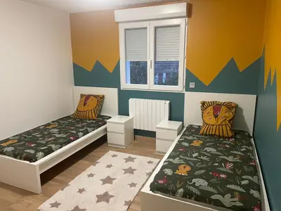 Un ou plusieurs lits dans un hébergement de l'établissement Pavillion Peuple de l'Herbe