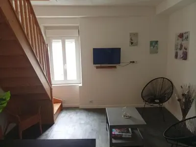 Télévision ou salle de divertissement dans l'établissement Duplex aux Portes de Seine