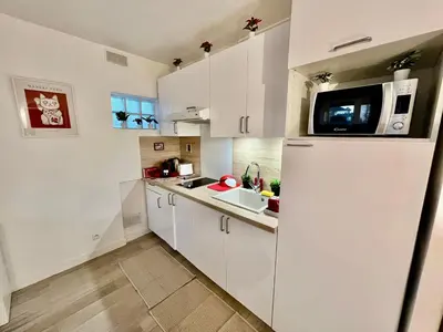 Cuisine ou kitchenette dans l'établissement Neuf et lumineux 2min Gare - 20min Paris
