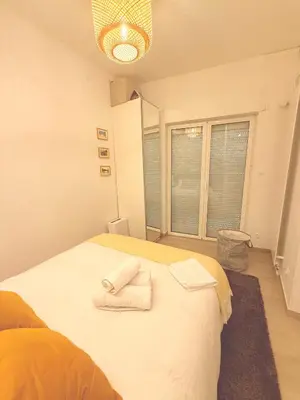 Un ou plusieurs lits dans un hébergement de l'établissement Maison Marie Charme & confort à Rouen centre