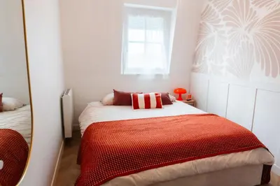 Un ou plusieurs lits dans un hébergement de l'établissement Suite cozy pour pros et séjours confort