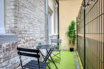 Terrasse ou espace extérieur de l'établissement Chez jeanne - Studio rénové balnéo et balcon centre