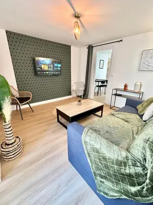 Coin salon dans l'établissement Saphir Apartment 2 rooms Senlis Centre Parc Astérix