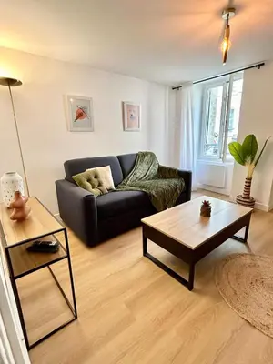 Coin salon dans l'établissement Saphir Apartment 2 rooms Senlis Centre Parc Astérix
