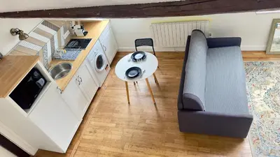 Cuisine ou kitchenette dans l'établissement Duplex Beauvoisine