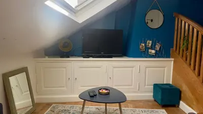 Télévision ou salle de divertissement dans l'établissement Duplex Beauvoisine