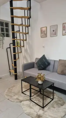 Coin salon dans l'établissement Cocon cosy en plein centre ville proche Paris à 2 pas de la gare