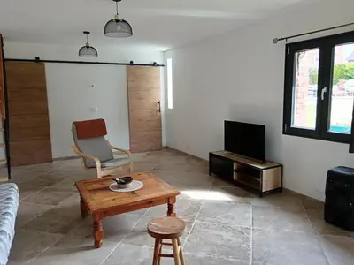 Télévision ou salle de divertissement dans l'établissement Le gîte Normand
