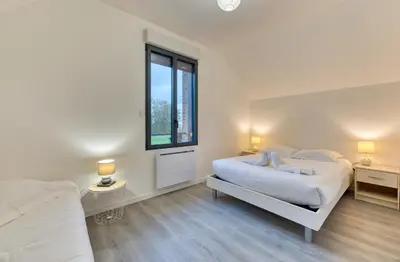 Un ou plusieurs lits dans un hébergement de l'établissement Le Hameau Paisible