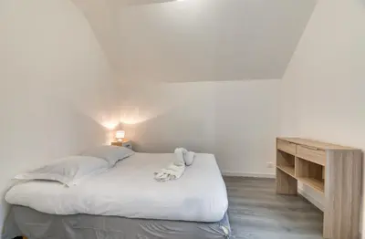 Un ou plusieurs lits dans un hébergement de l'établissement Le Hameau Paisible