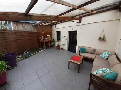 Coin salon dans l'établissement Maison cosy pour famille - groupe proche toutes commodités