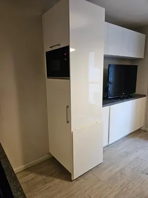 Cuisine ou kitchenette dans l'établissement Appartement entier T2 proche gare de Cergy préfecture