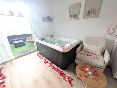 Un ou plusieurs lits dans un hébergement de l'établissement Suite Évasion Spa - Tiny House